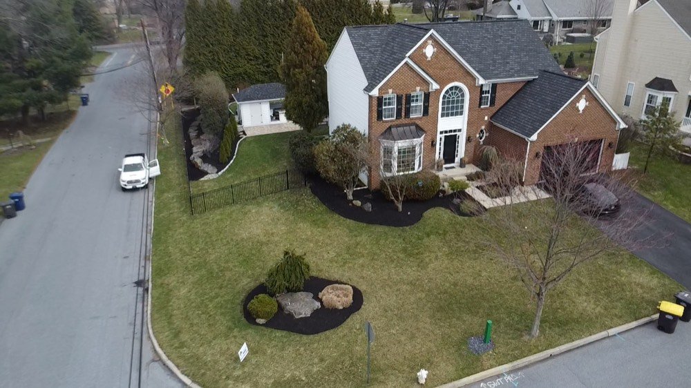 Aerial view of a complete front-yard landscape renovation